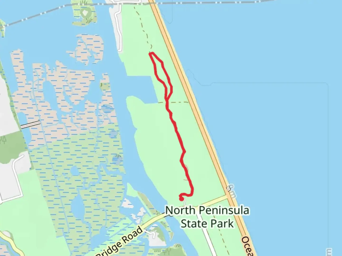 An image depicting the trail Coastal Strand Trail and its surrounding area.