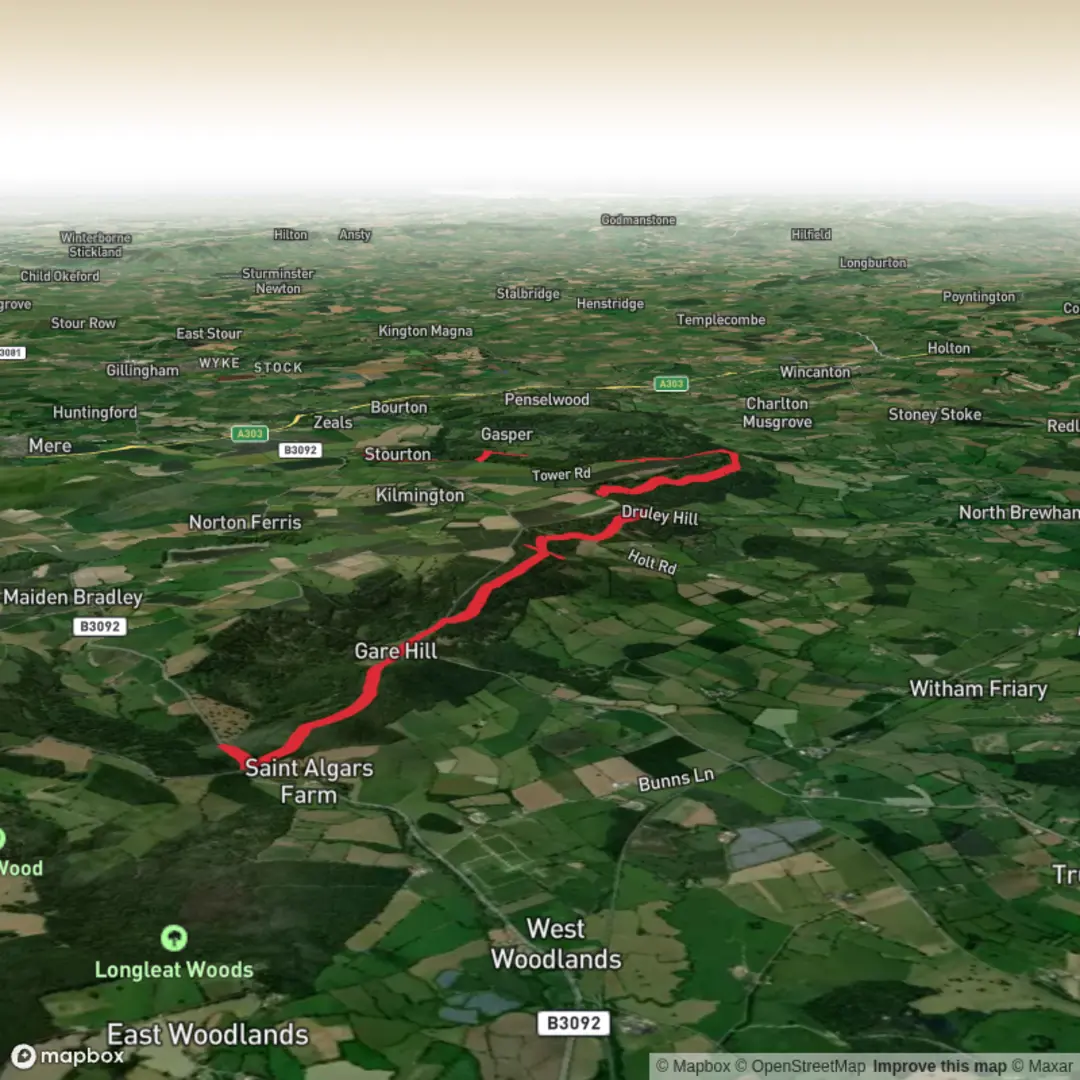 An image depicting the trail Stourhead Woodland Approach - Planned (from Great Bradley Woods) and its surrounding area.