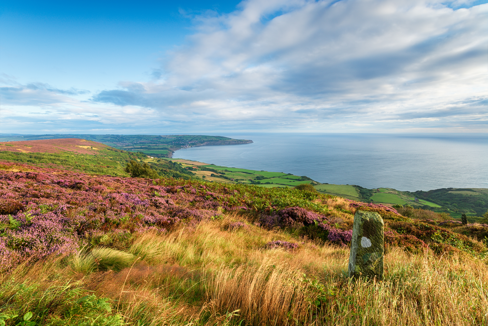An image depicting the trail Robin Hood's Bay from Ravenscar and its surrounding area.