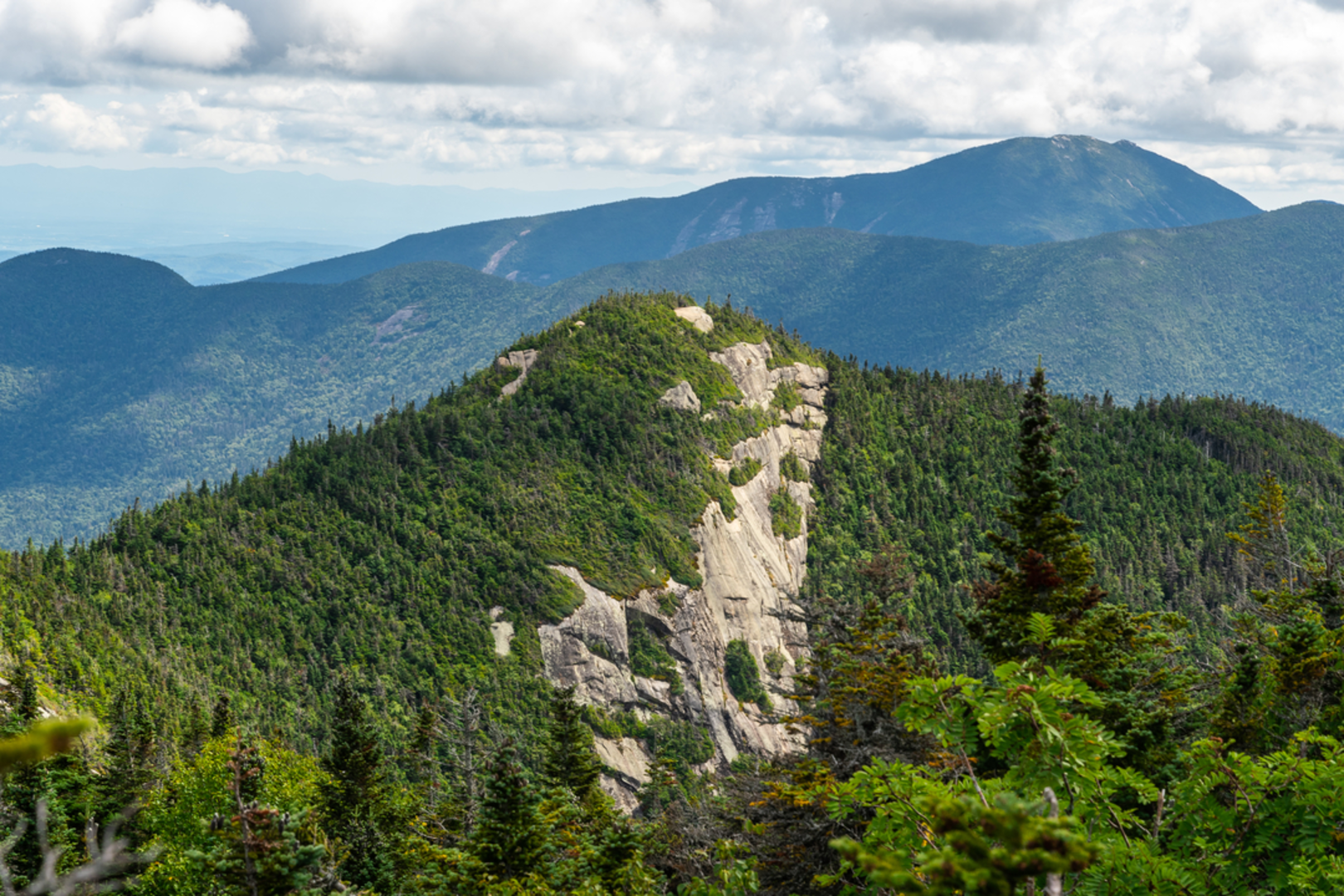 An image depicting the trail Upper Wolfjaw Mountain - Armstrong Mountain - Gothics and Pyramid Peak Loop and its surrounding area.