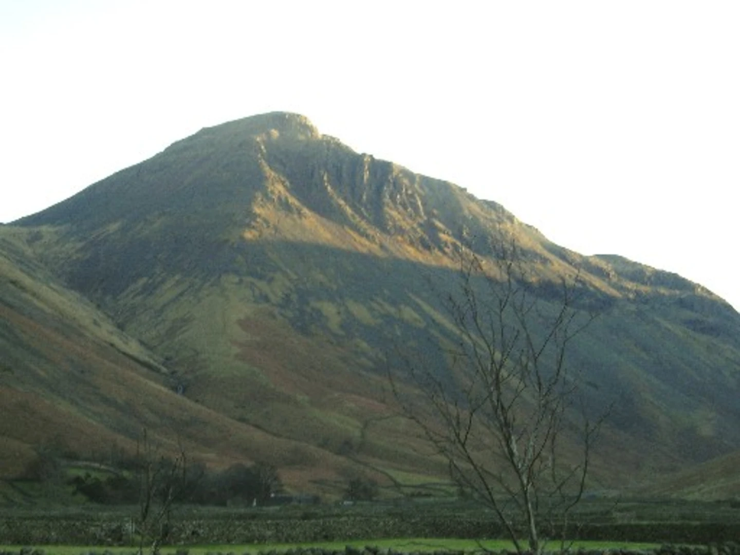 An image depicting the trail Windy Gap, Great Gable, Styhead Tarn Loop - Seathwaite and its surrounding area.