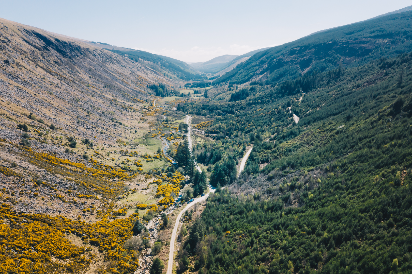 An image depicting the trail Lugnaquilla via Glenmalure and its surrounding area.