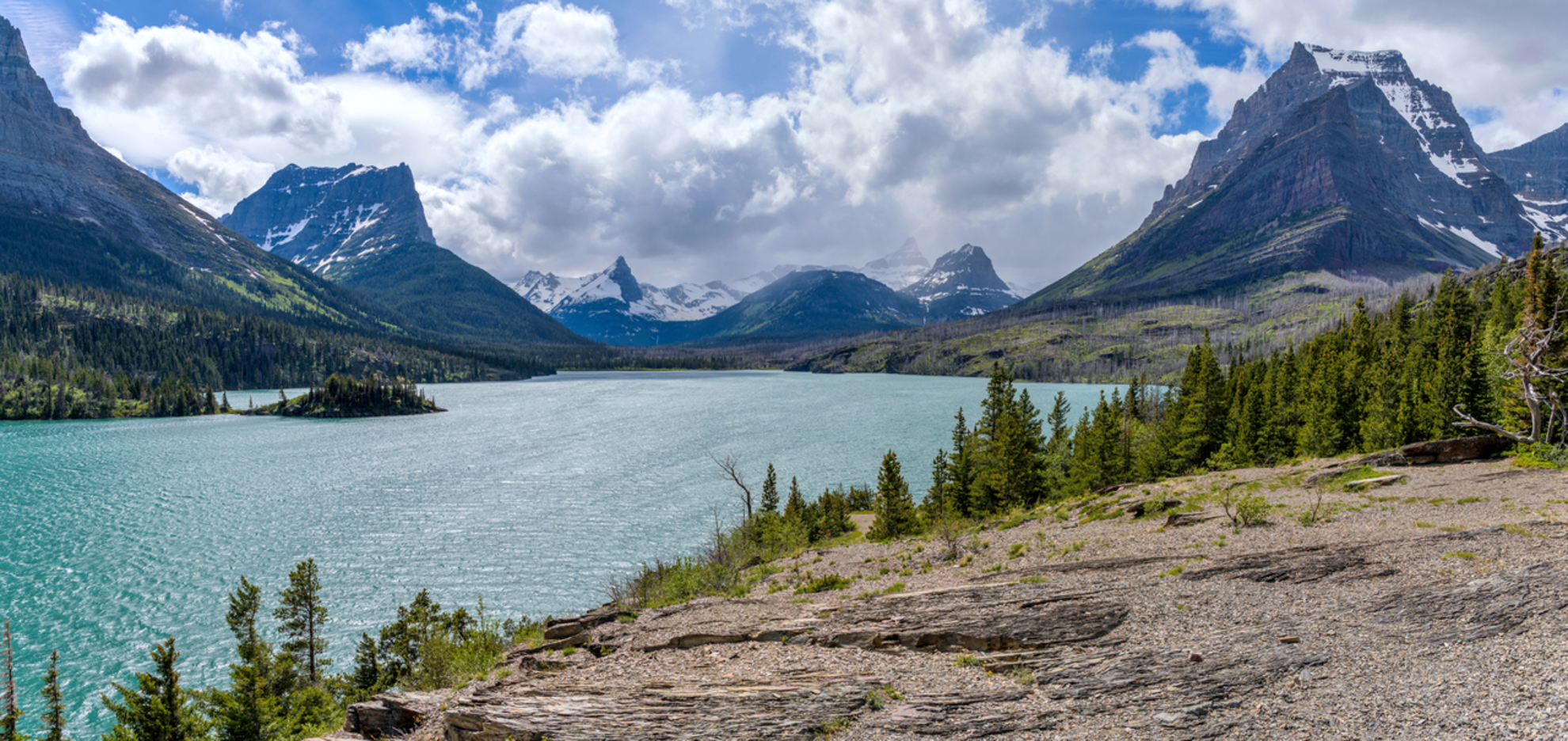 An image depicting the trail Saint Mary Lake Trail and its surrounding area.
