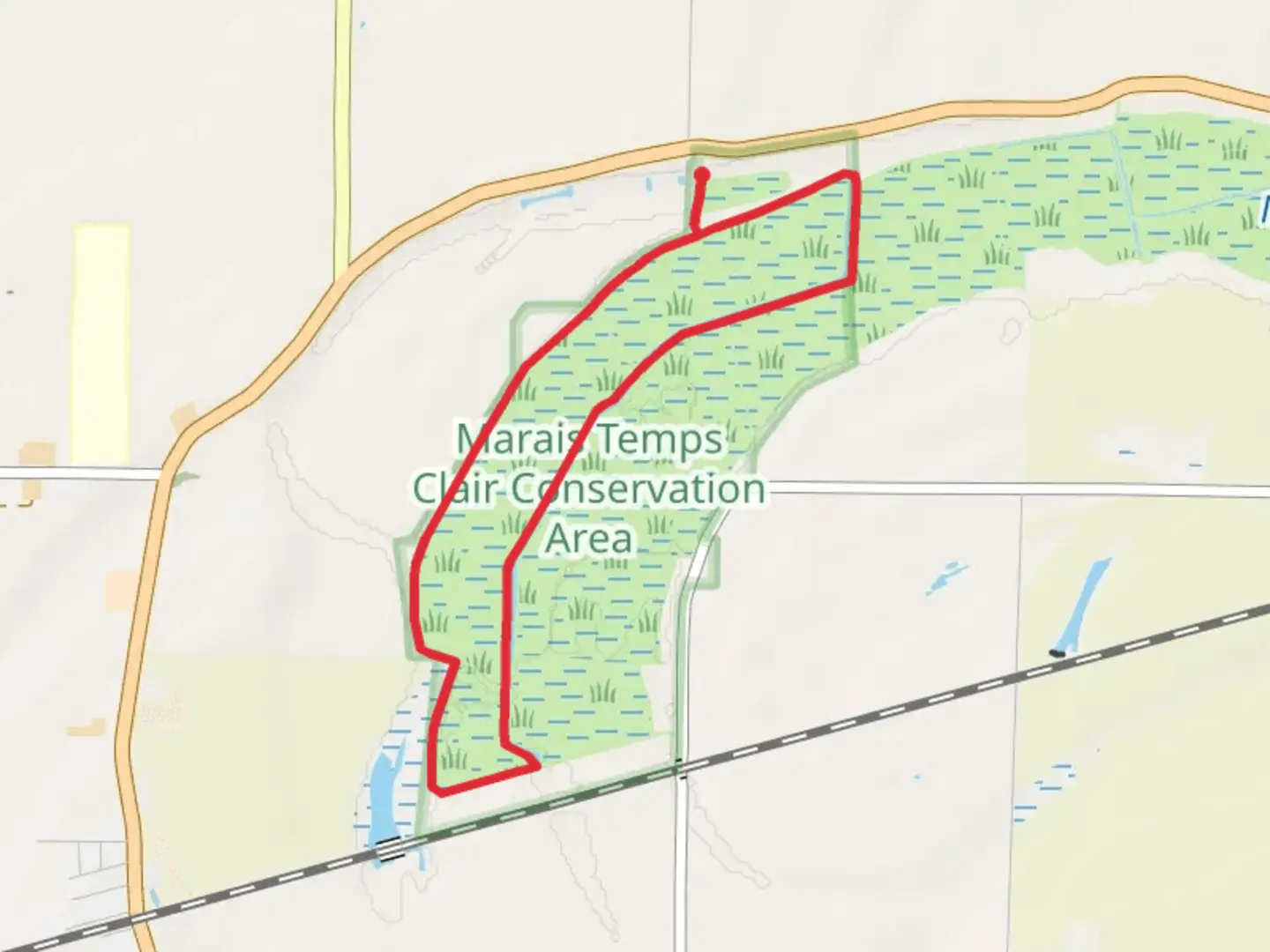 An image depicting the trail Marais Temps Clair Conservation Area Loop and its surrounding area.