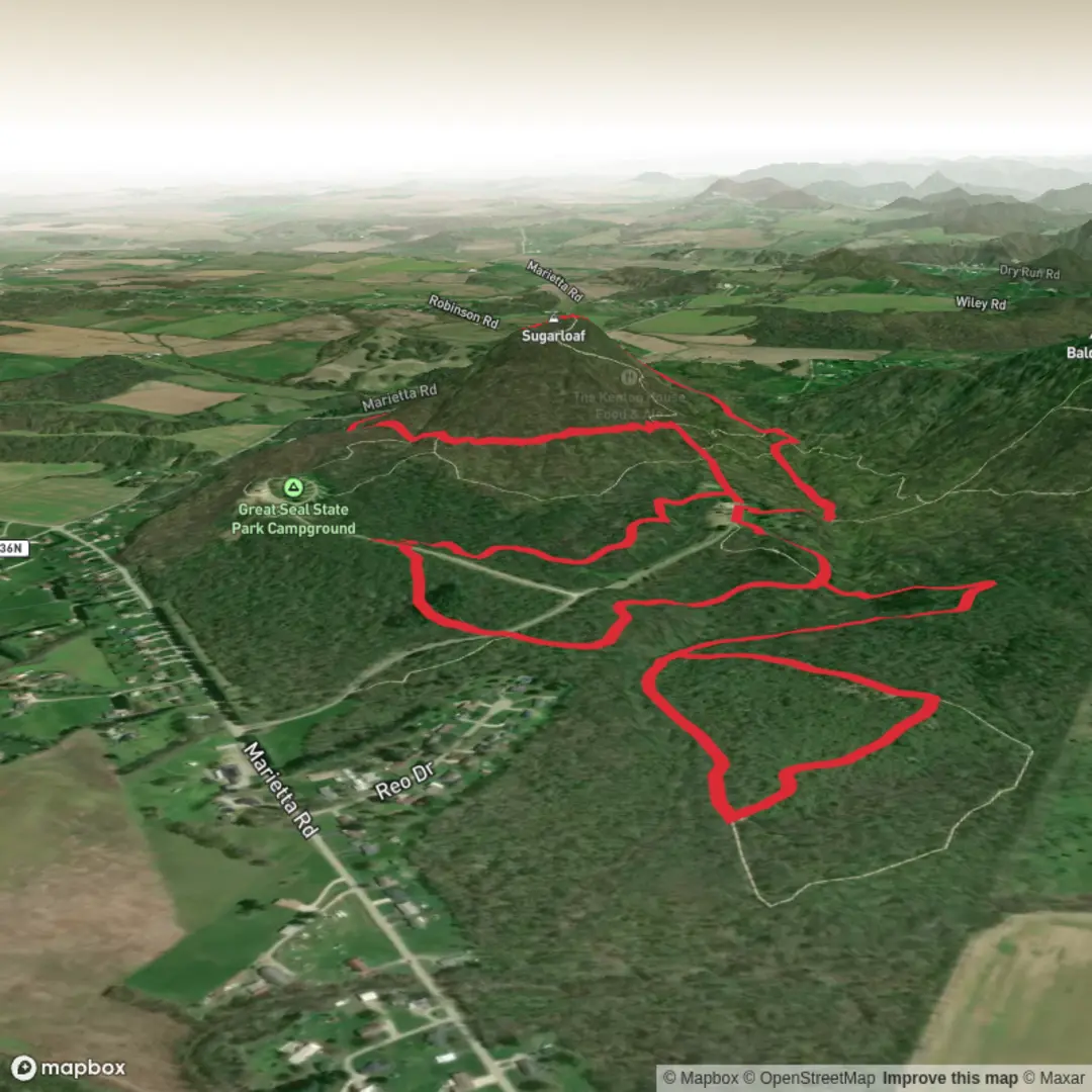 An image depicting the trail Sugarloaf Mountain via Sugarloaf Mountain Trail and Spring Run and its surrounding area.