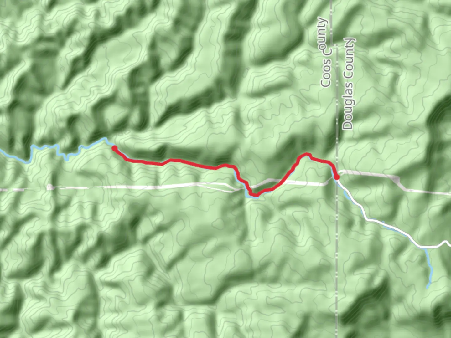 An image depicting the trail East Fork Coquille River and its surrounding area.