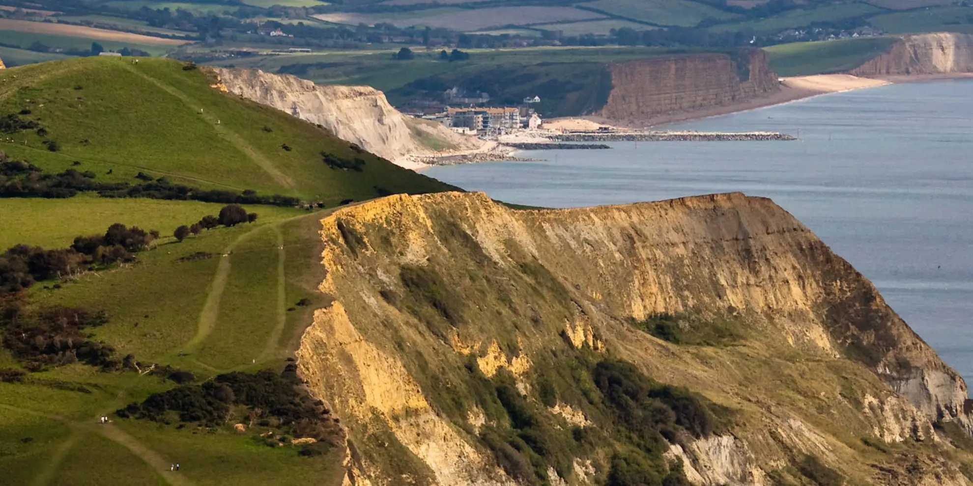 An image depicting the trail Golden Cap to Bridport and West Bay Walk and its surrounding area.