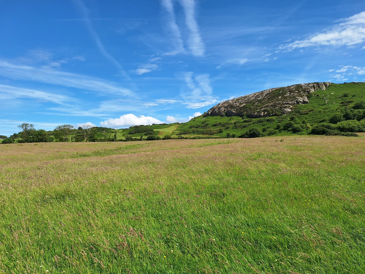 An image depicting the trail Hike from Brynrefail to Yr Arwydd and its surrounding area.