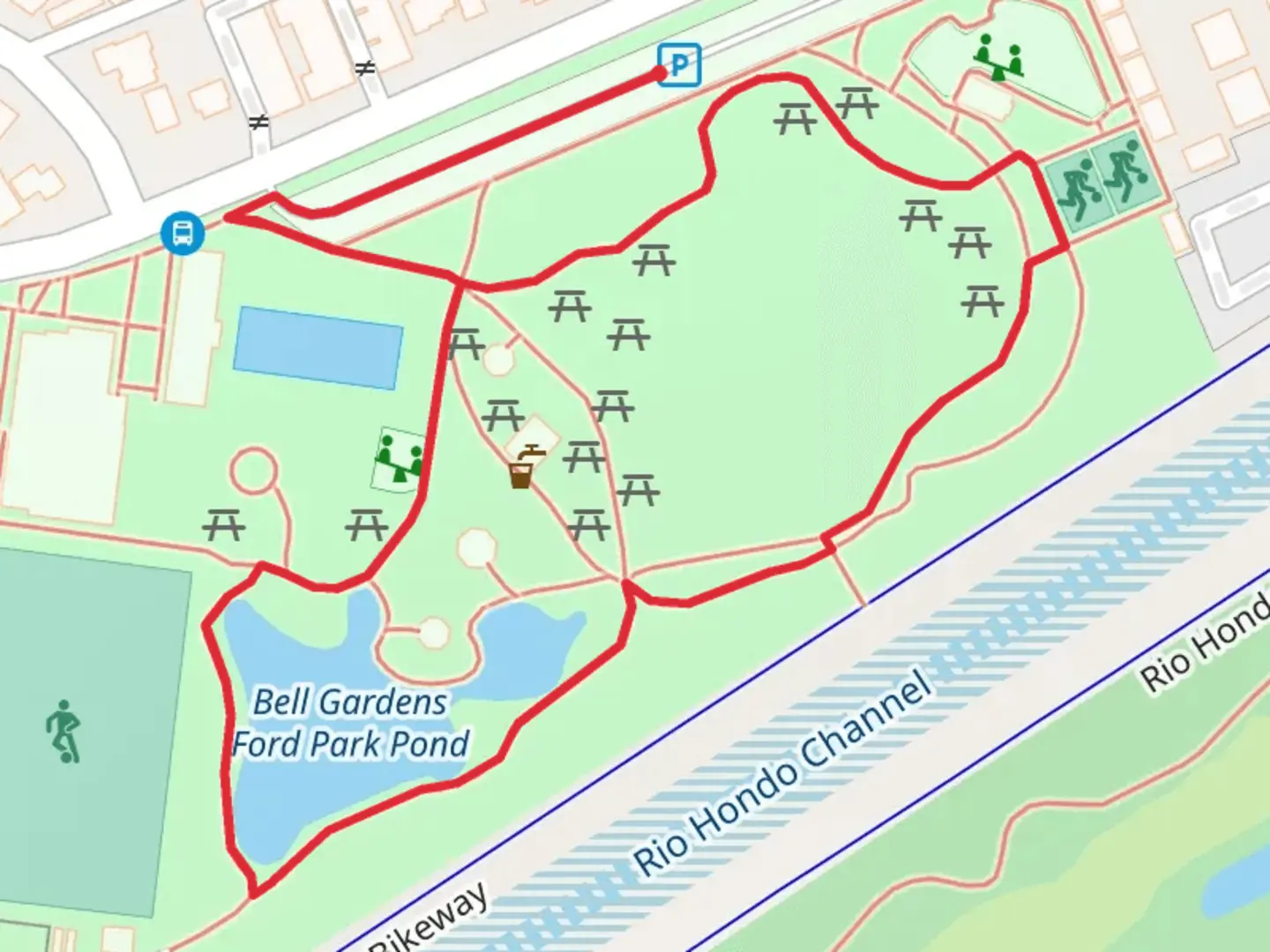 An image depicting the trail Bell Gardens Ford Park Pond Loop and its surrounding area.