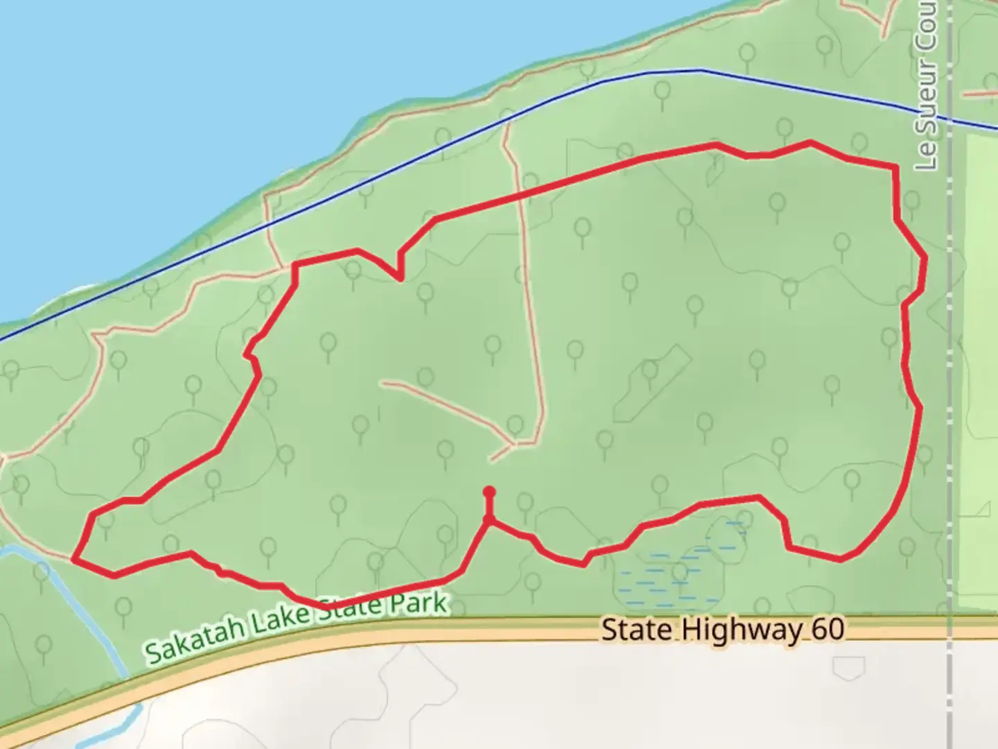 An image depicting the trail Hidden Pond, Oak Tree and Sumac Loop Trail and its surrounding area.