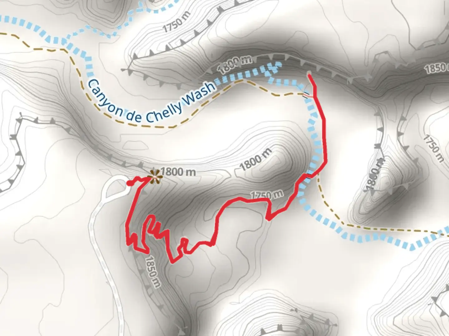 An image depicting the trail Canyon de Chelly Wash via White House Trail and its surrounding area.
