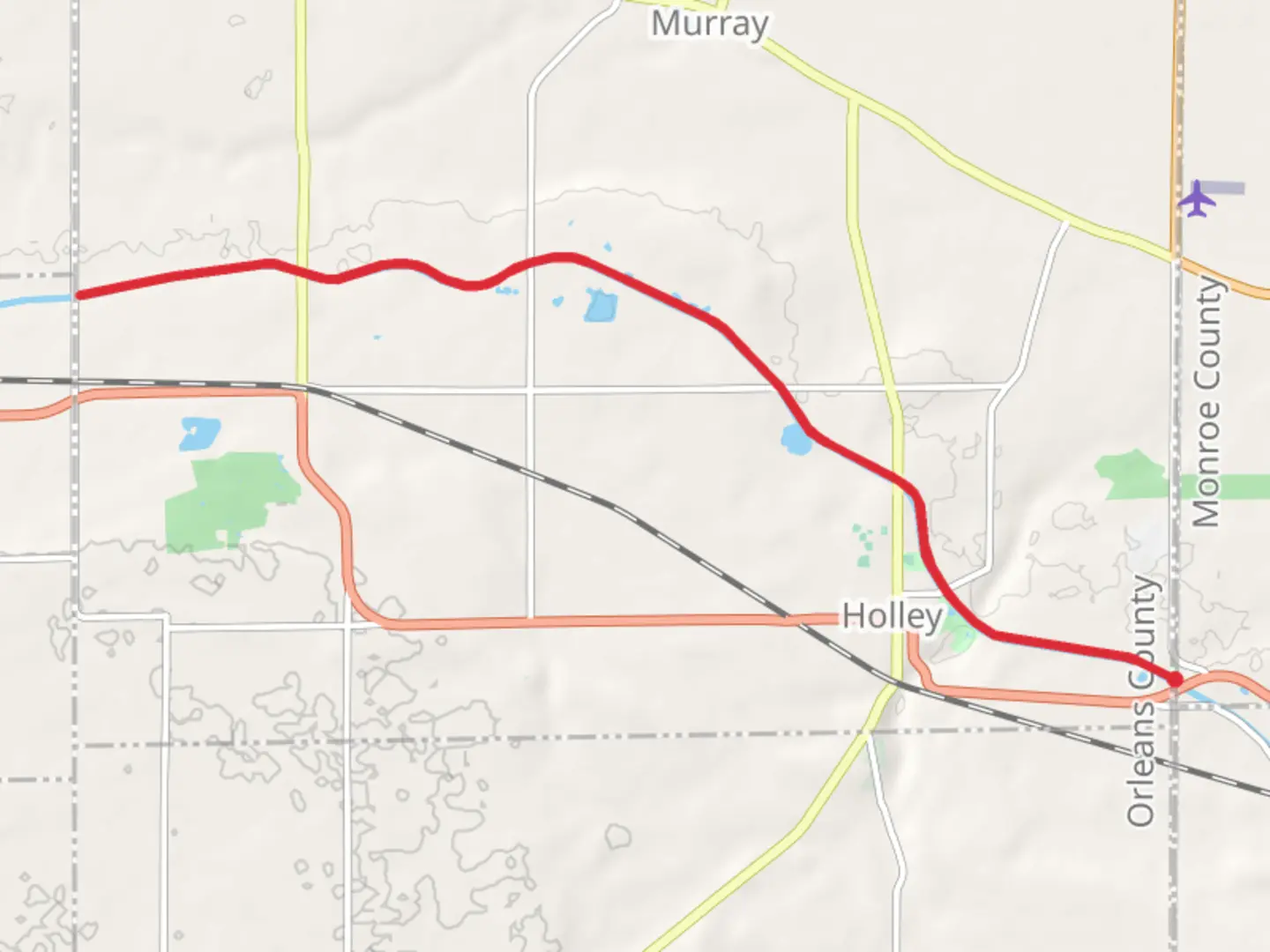An image depicting the trail Erie Canal from Monroe Orleans County Line Road and its surrounding area.