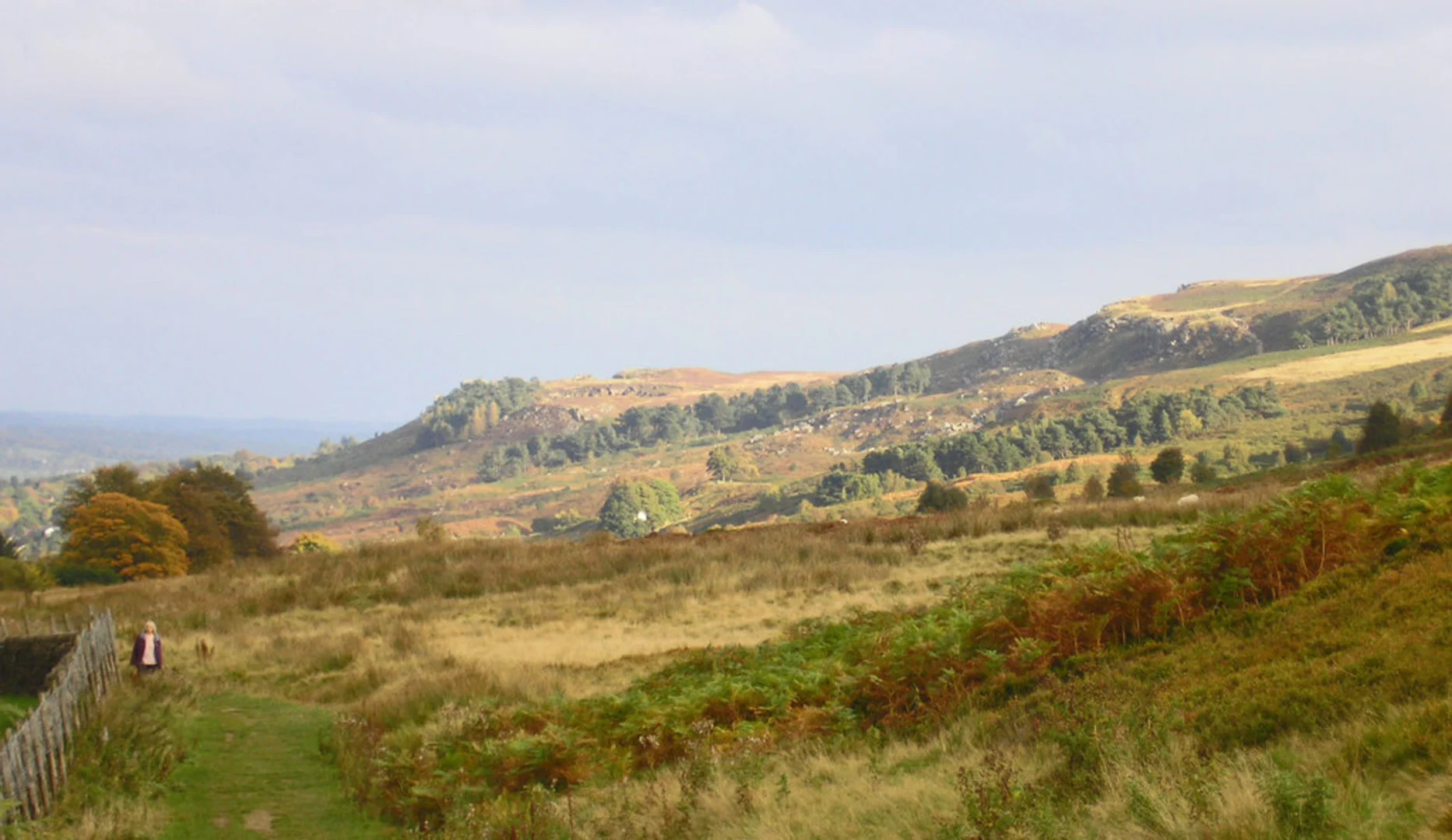 An image depicting the trail Ilkley Southern Loop via Badger Stone, Twelve Apostles and The Tarn and its surrounding area.