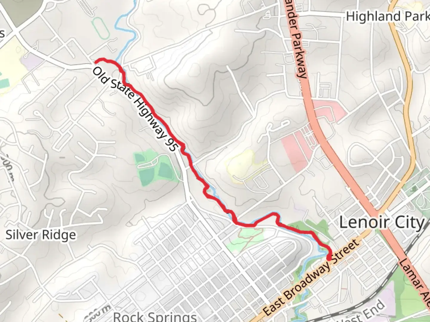 An image depicting the trail Town Creek Greenway and its surrounding area.