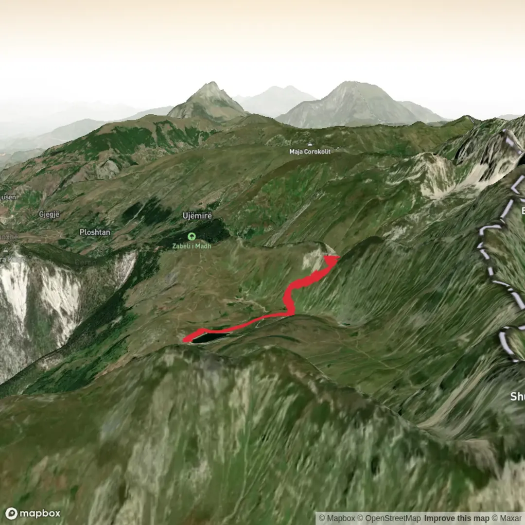 An image depicting the trail Grama Lake from Radomirë and its surrounding area.