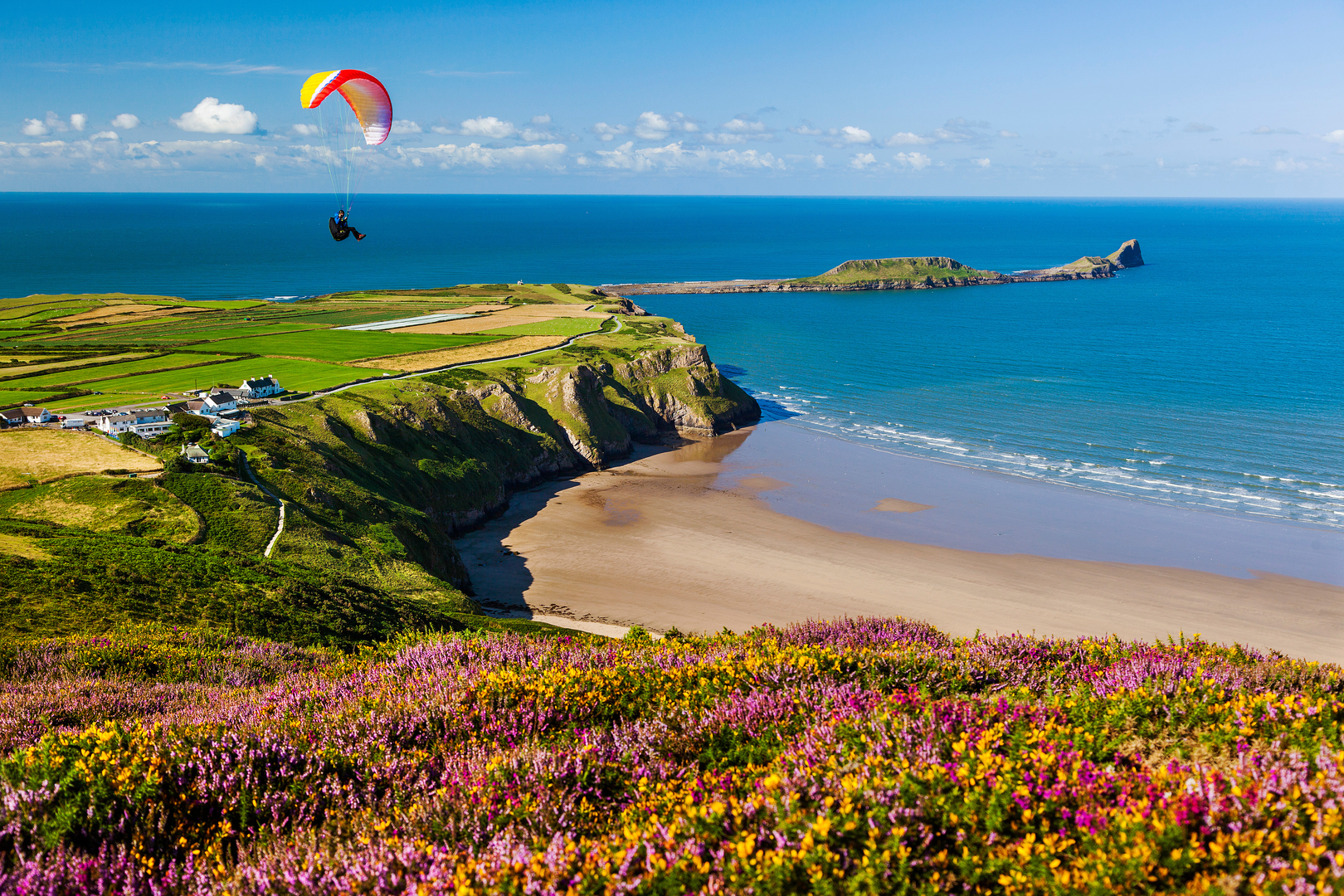 An image depicting the trail Harding's Down and Rhossili Down from Rhossili and its surrounding area.