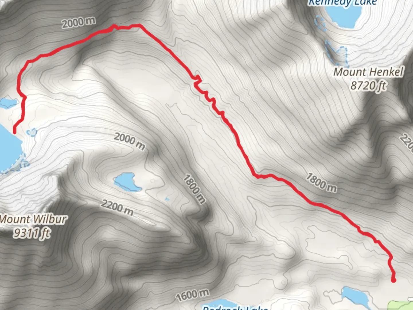 An image depicting the trail Iceberg Lake via Ptarmigan Trail and its surrounding area.