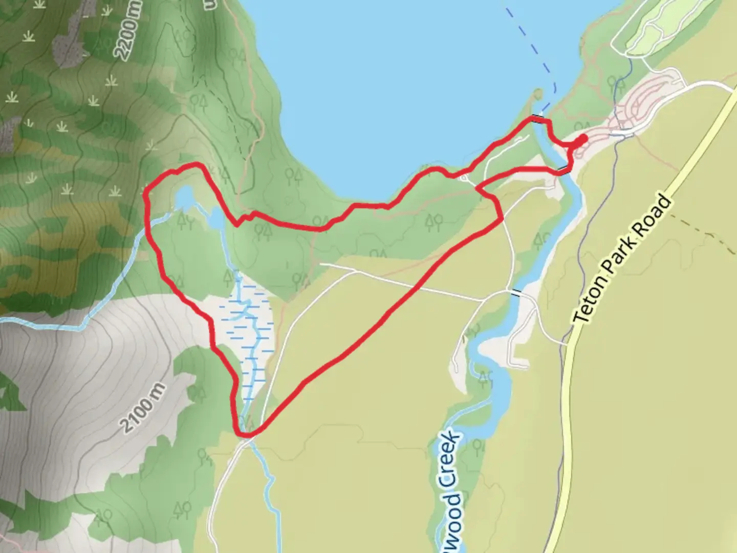 An image depicting the trail Moose Pond Trail and Jenny Lake Loop Trail and its surrounding area.