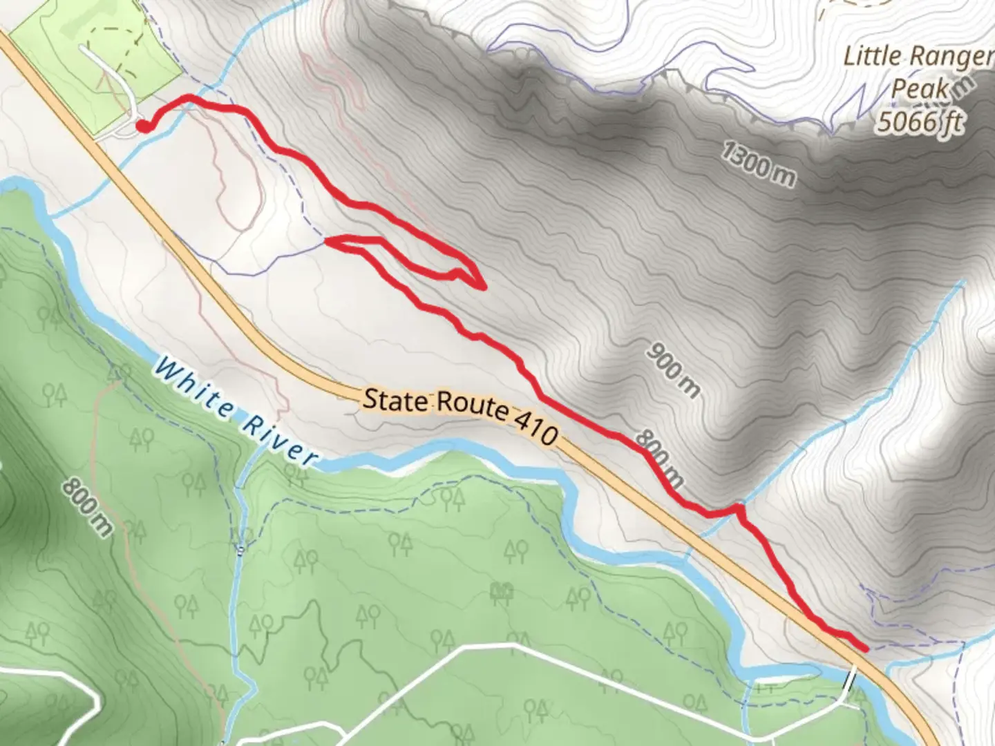 An image depicting the trail Snoquera Falls and White River Trail and its surrounding area.