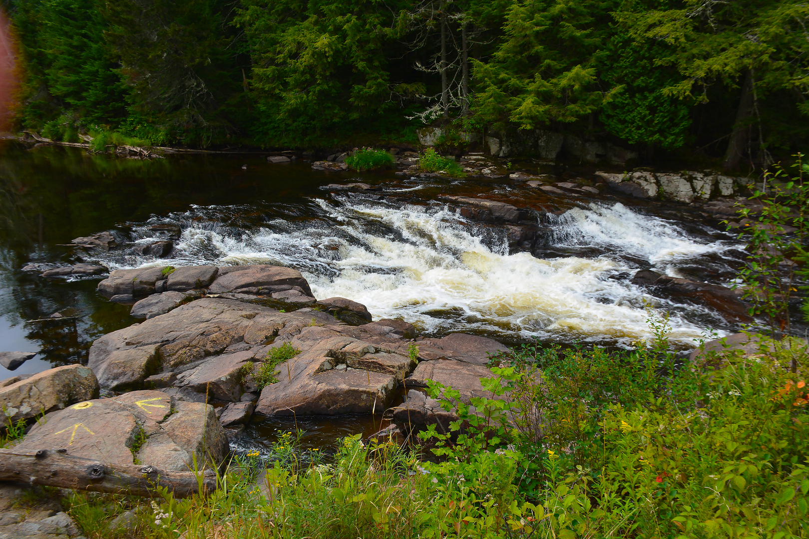 An image depicting the trail Monument Falls - Wilmington Notch and its surrounding area.