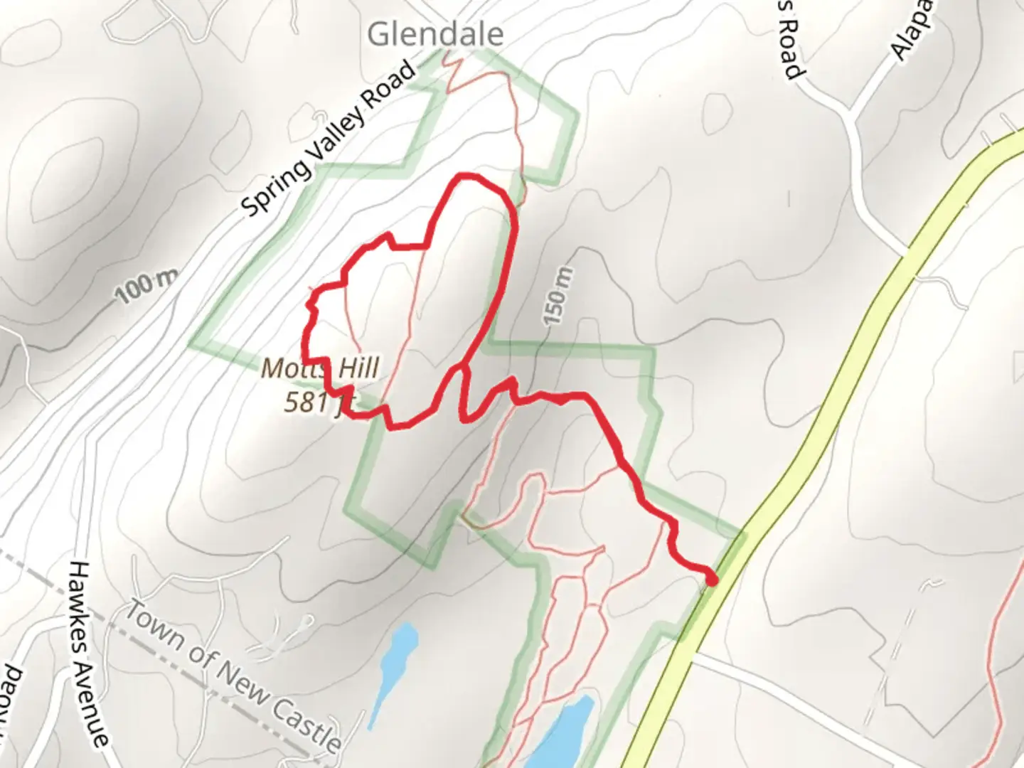 An image depicting the trail Motts Hill Loop and its surrounding area.