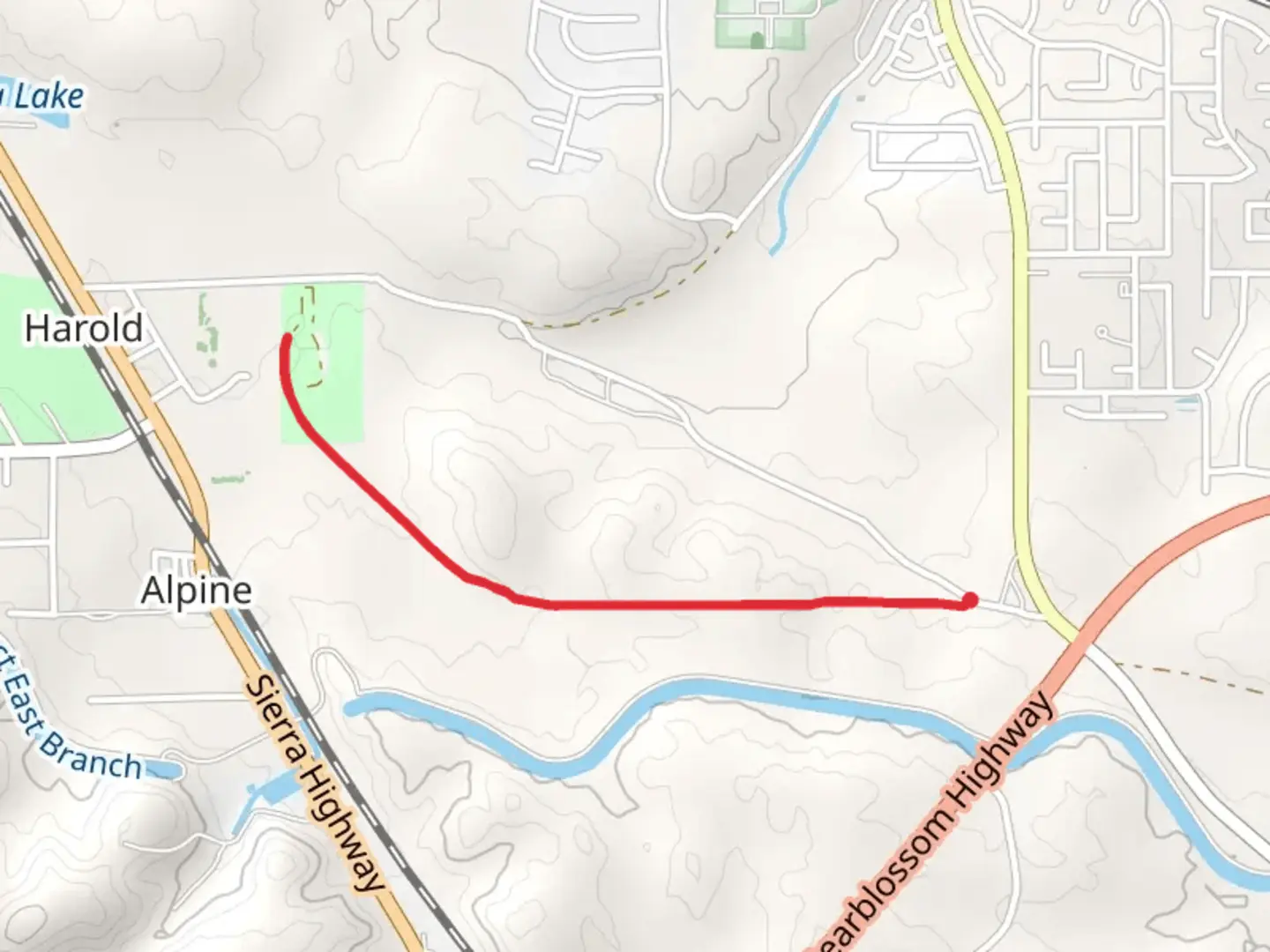 An image depicting the trail Tejon Park and its surrounding area.