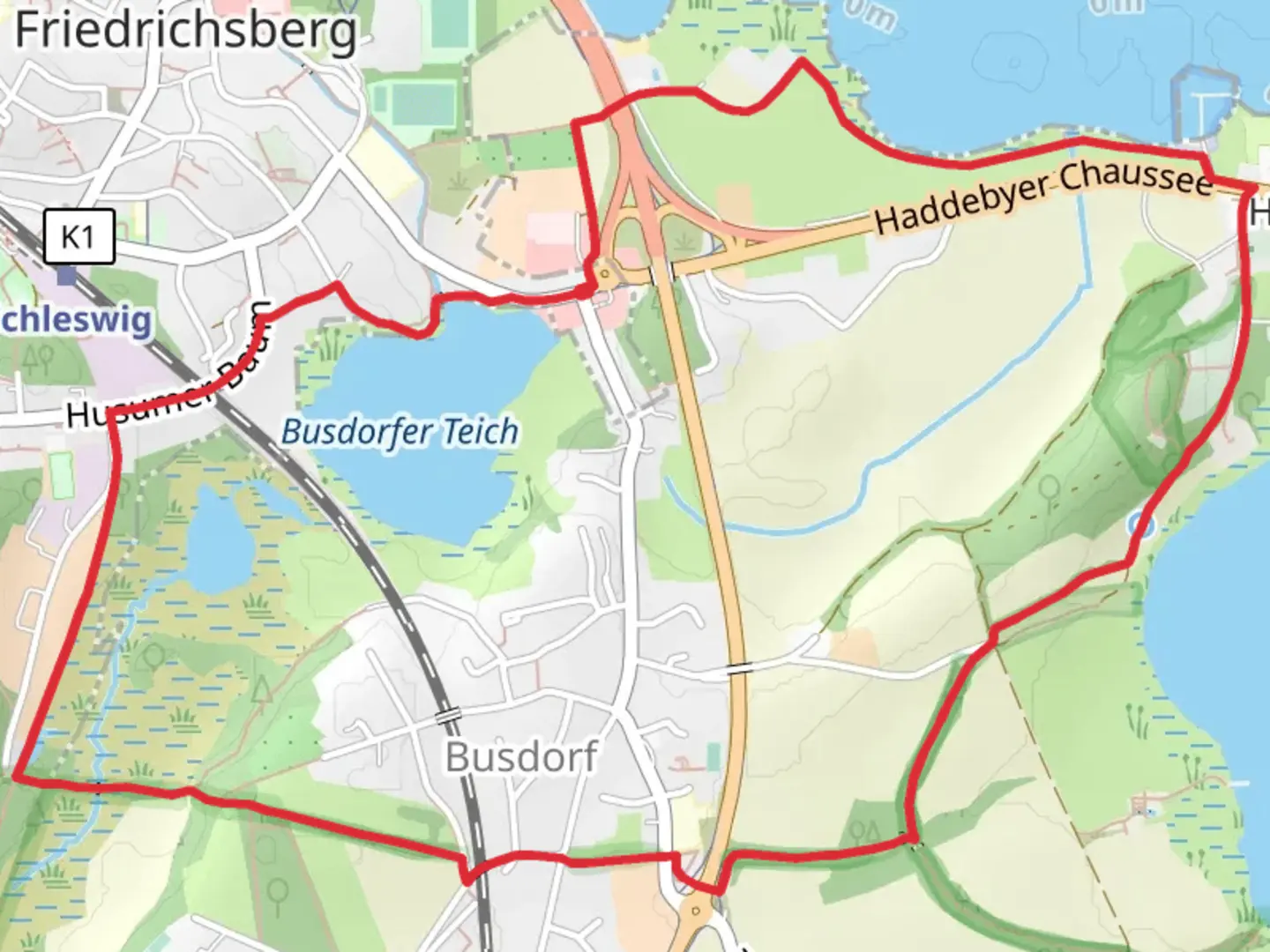 An image depicting the trail Busdorfer Teich via Wikingerland and its surrounding area.