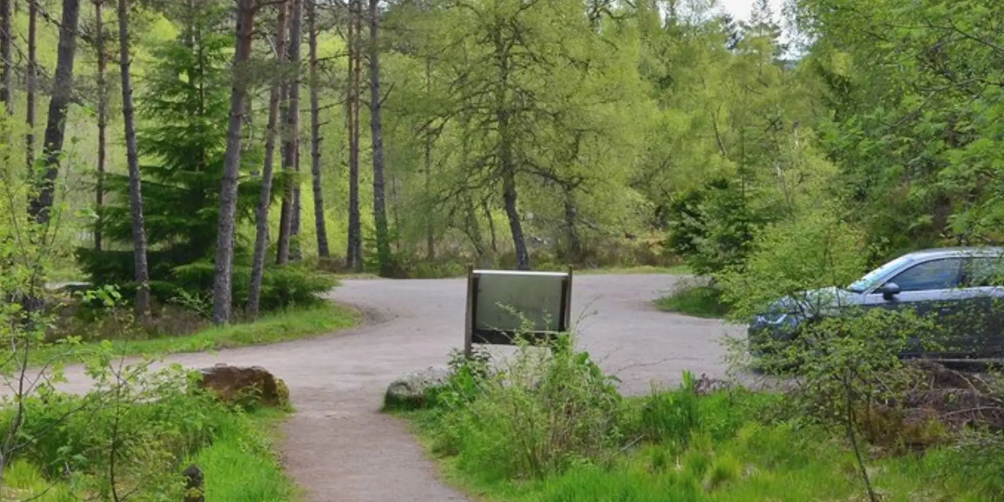 An image depicting the trail Laggan Path - Druim an Aird Township Trail and its surrounding area.