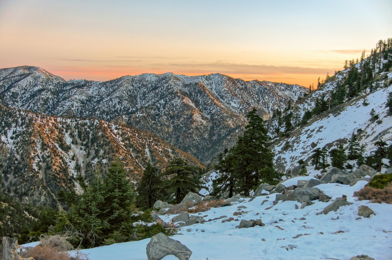 An image depicting the trail Mount San Antonio via Bear Canyon Trail and its surrounding area.