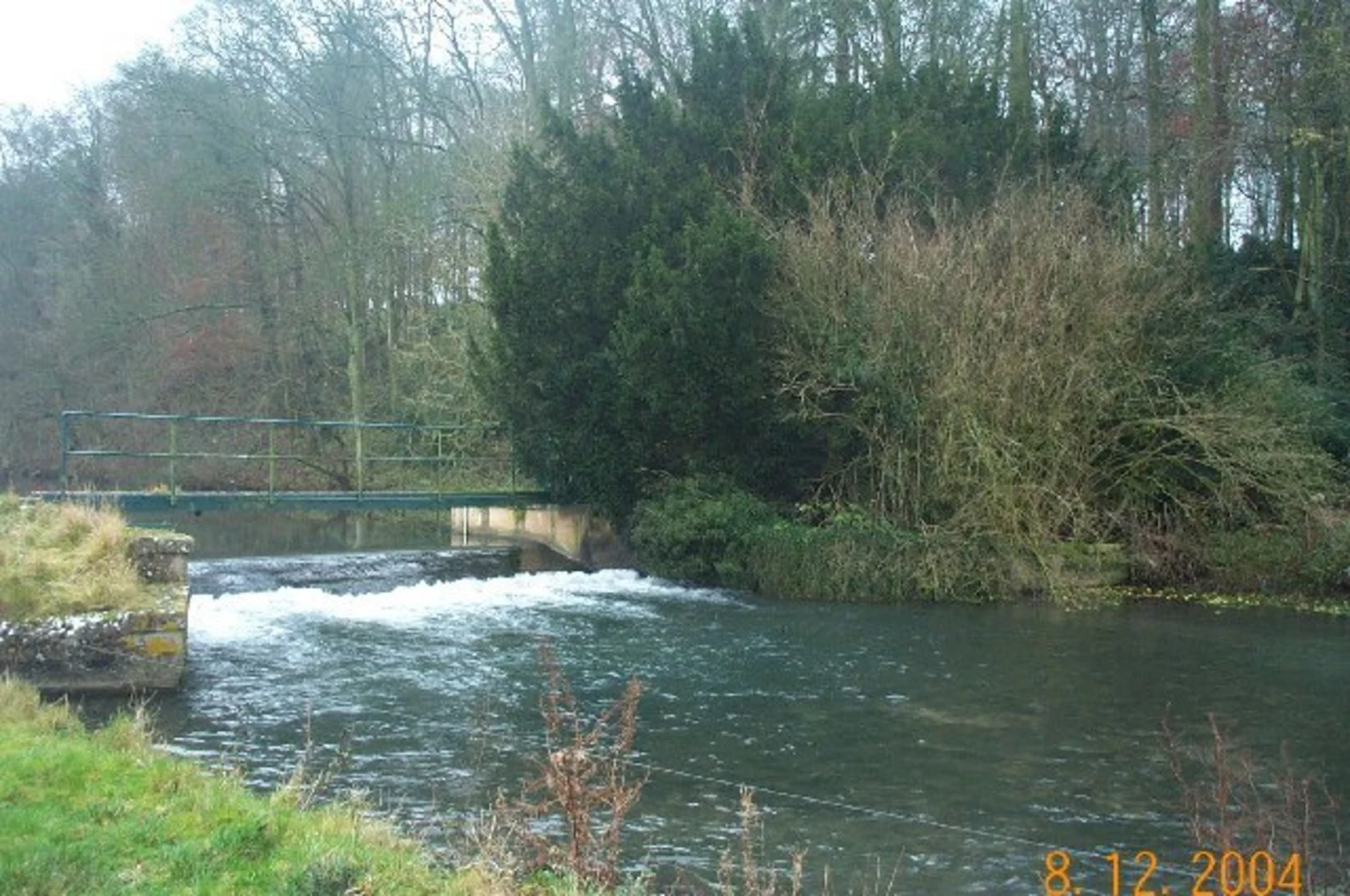An image depicting the trail Bibury and the River Coln and its surrounding area.