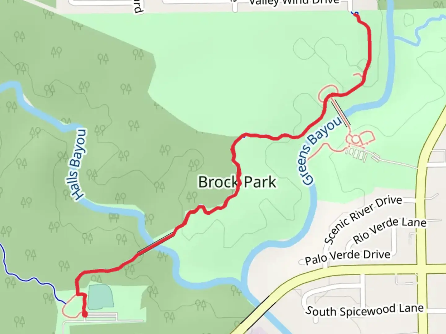 An image depicting the trail Greens Bayou Greenway and its surrounding area.