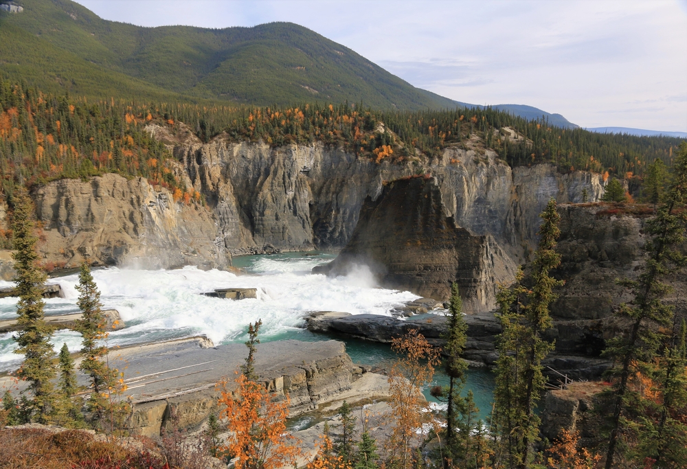 An image depicting the trail Nahanni National Park Reserve of Canada and its surrounding area.