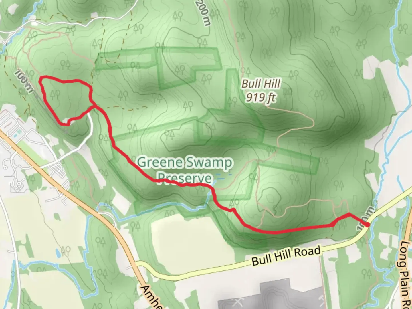An image depicting the trail Greene Swamp Bull Hill Road and its surrounding area.
