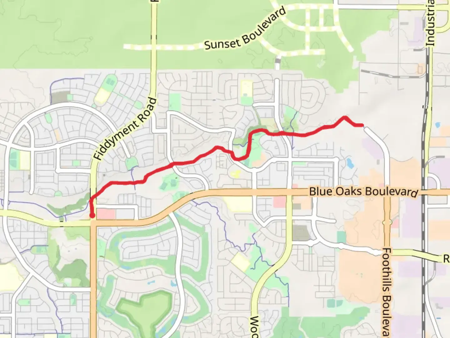 An image depicting the trail Pleasant Grove Creek Trail and its surrounding area.