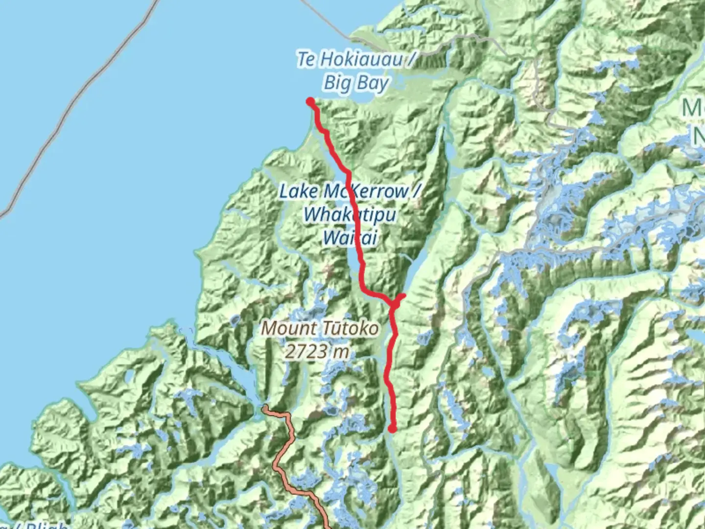 An image depicting the trail Hollyford Track and its surrounding area.