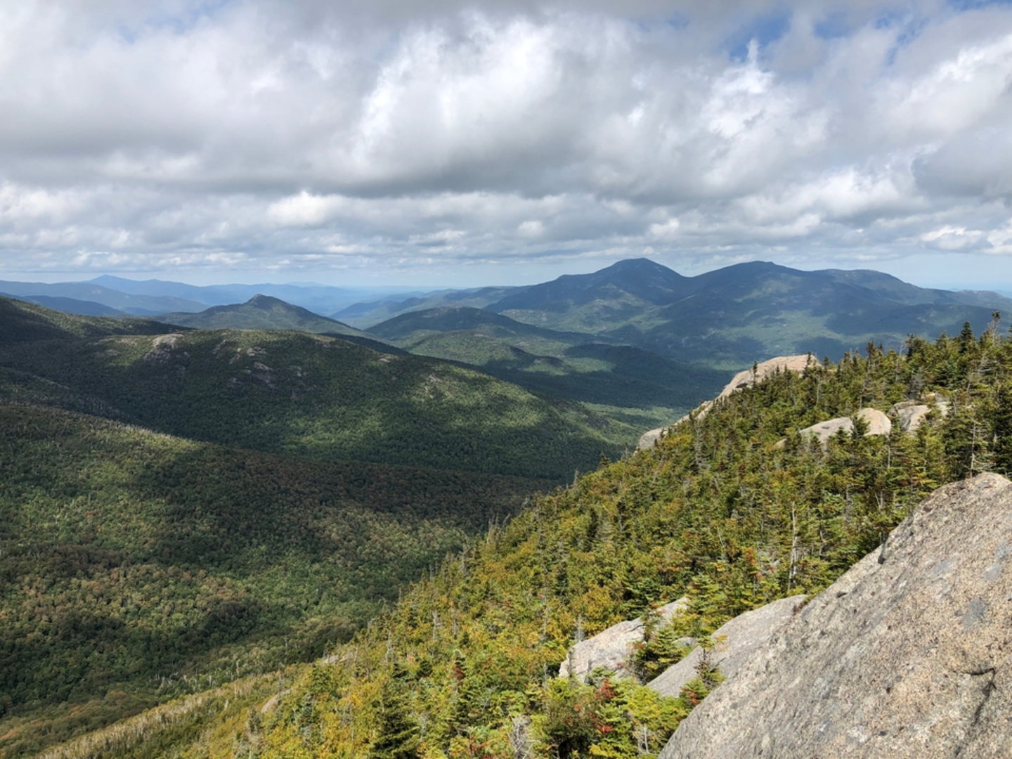 An image depicting the trail Indian Head, Nippletop and Dial Mountain via Gill Brook Trail Loop and its surrounding area.