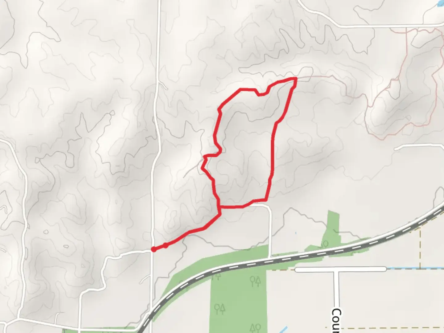 An image depicting the trail Holly Ridge Conservation Area Loop and its surrounding area.