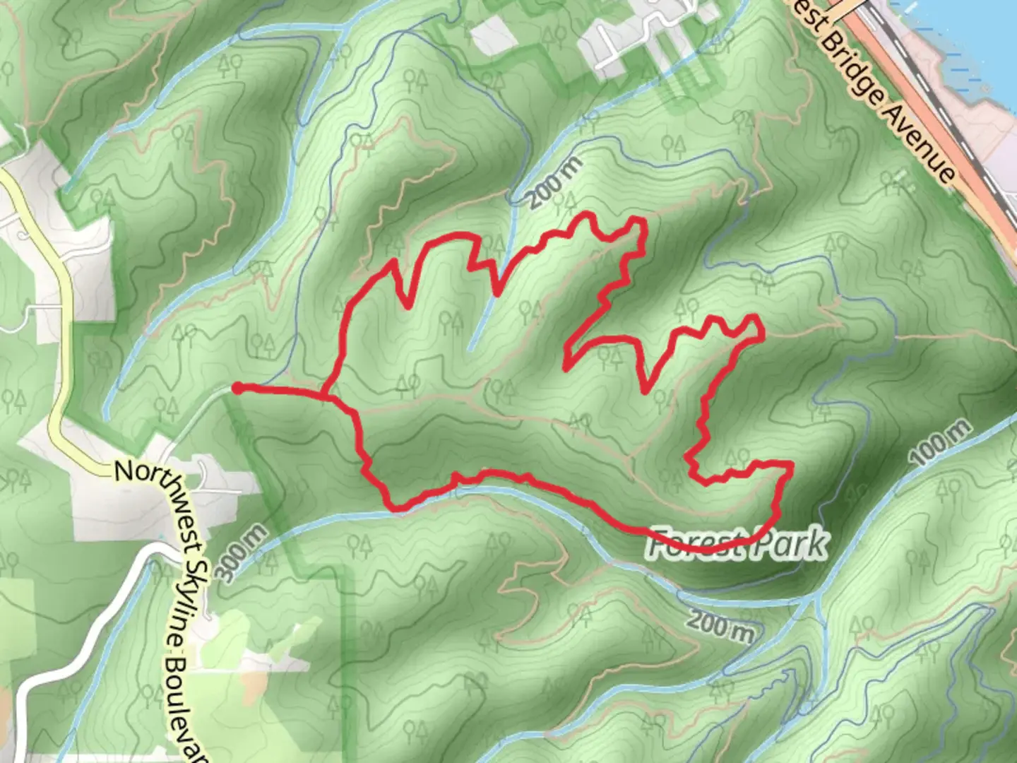An image depicting the trail Wildwood Loop Trail via Hardesty Trail and its surrounding area.
