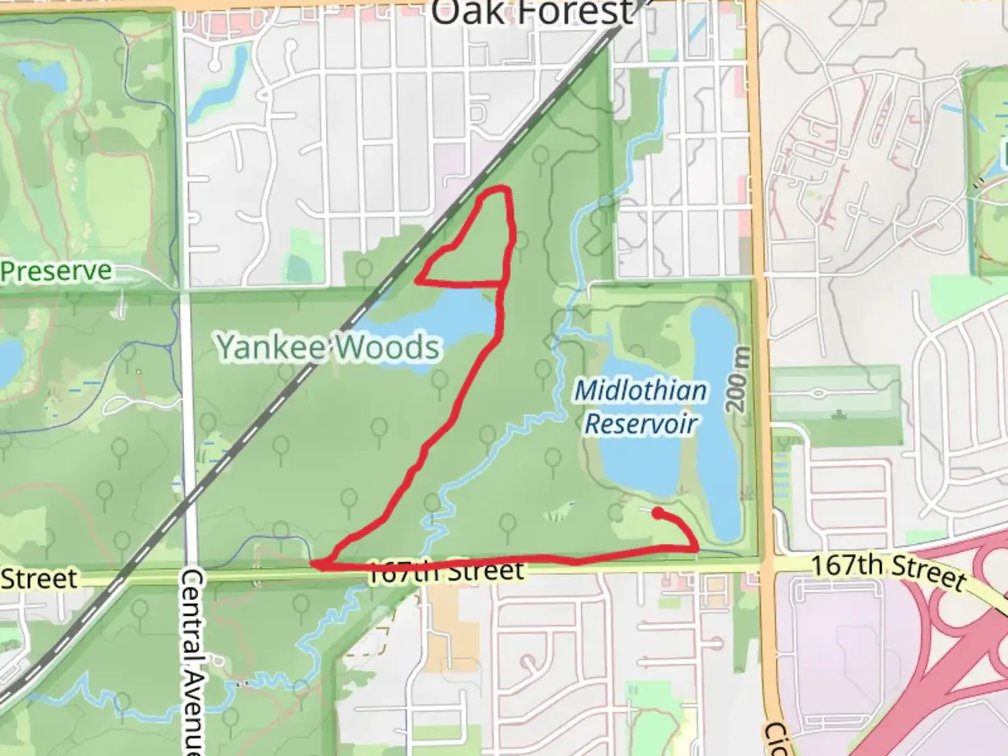 An image depicting the trail Tinley Creek Yellow Unpaved Trail and its surrounding area.