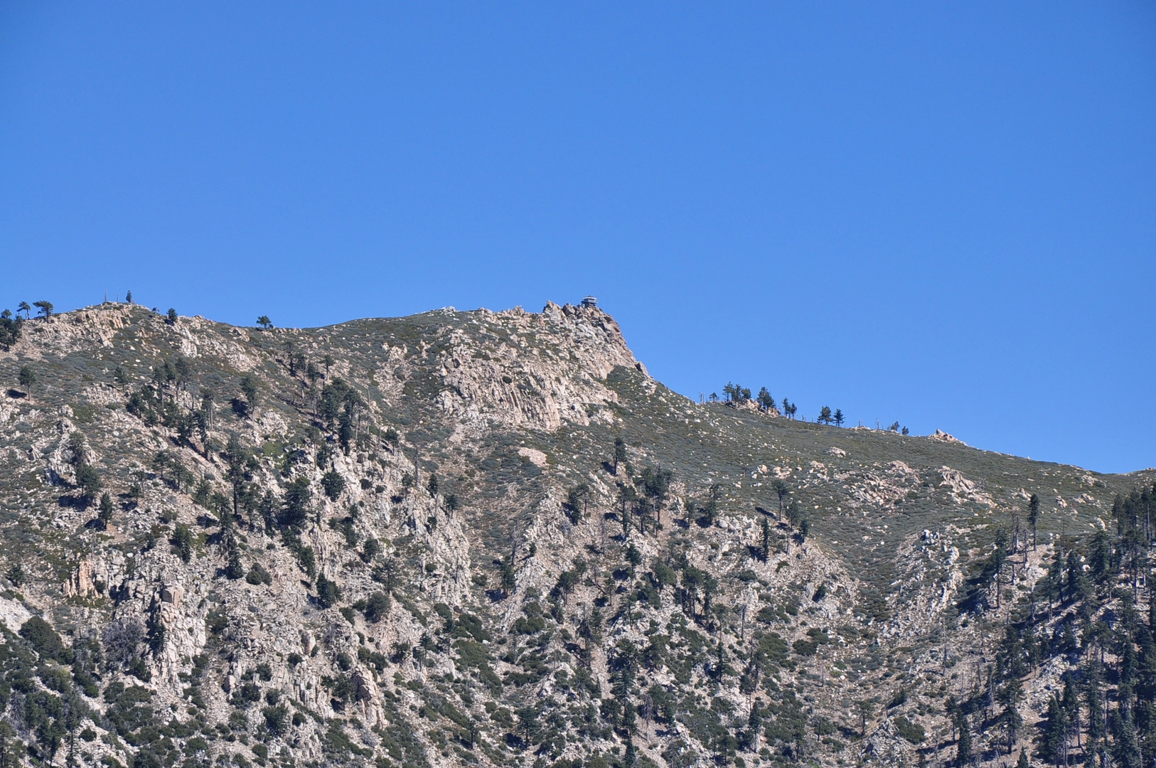 An image depicting the trail Butler Peak from Rim Of The World Drive and its surrounding area.