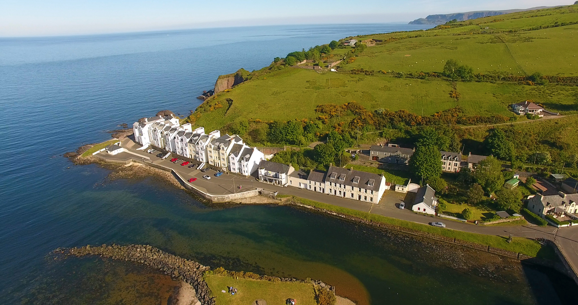 An image depicting the trail Cushendun Long Walk and its surrounding area.
