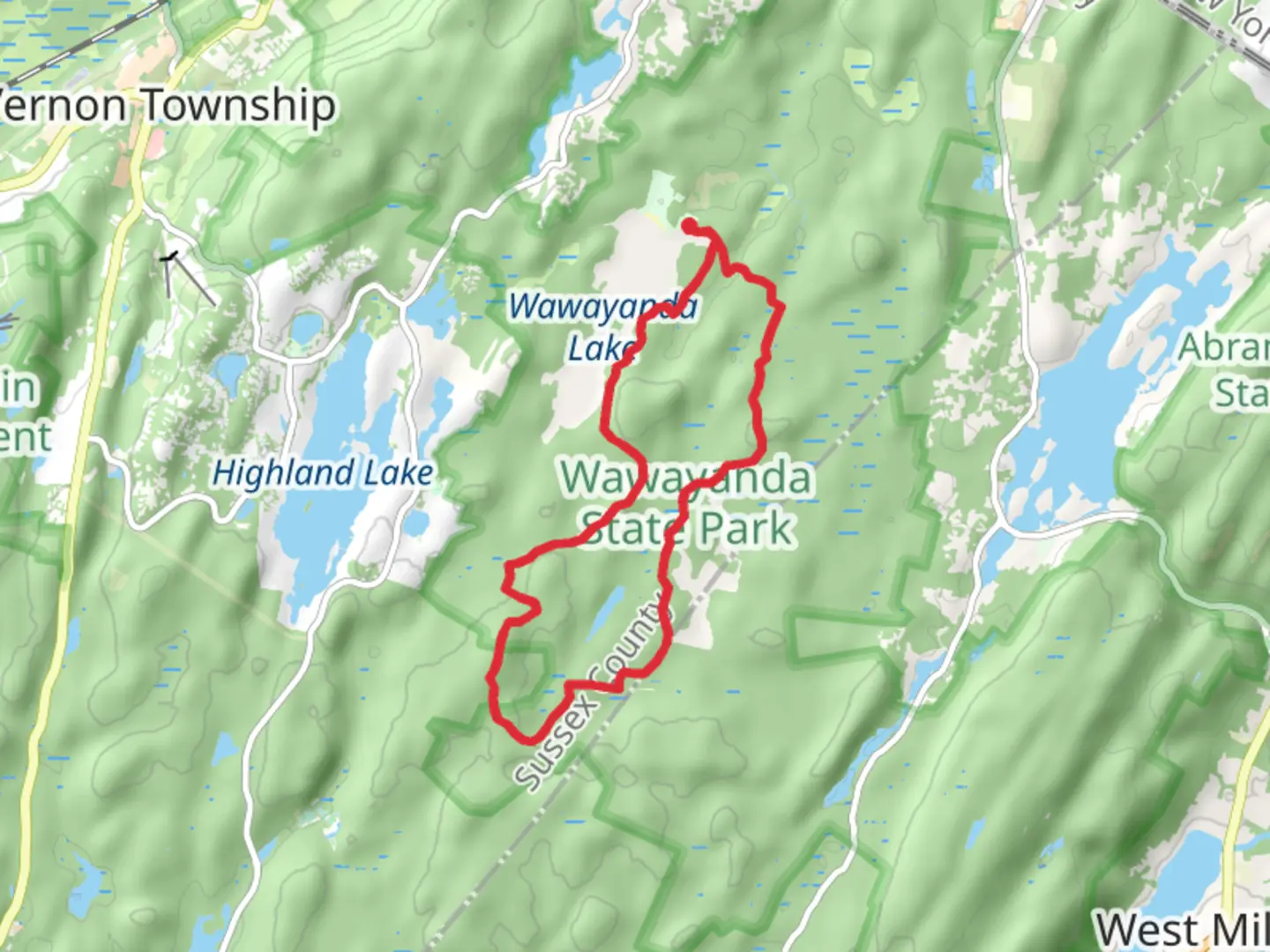 An image depicting the trail Wingdam, Overgrown Grass and NJ State Long Loop Trail and its surrounding area.