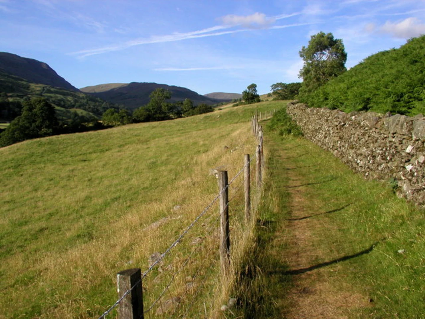 An image depicting the trail Stock Ghyll Woods, Wansfell and Baystones Walk and its surrounding area.