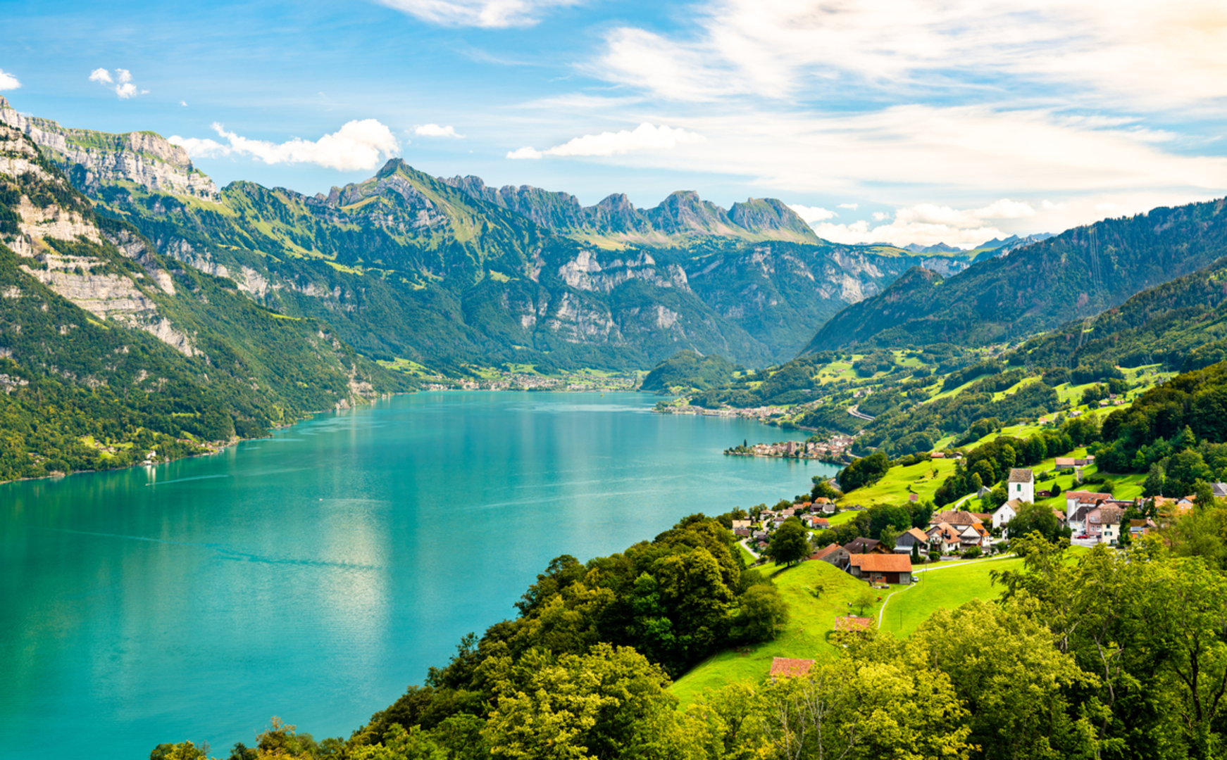An image depicting the trail Churfirsten and Lake Walen and its surrounding area.