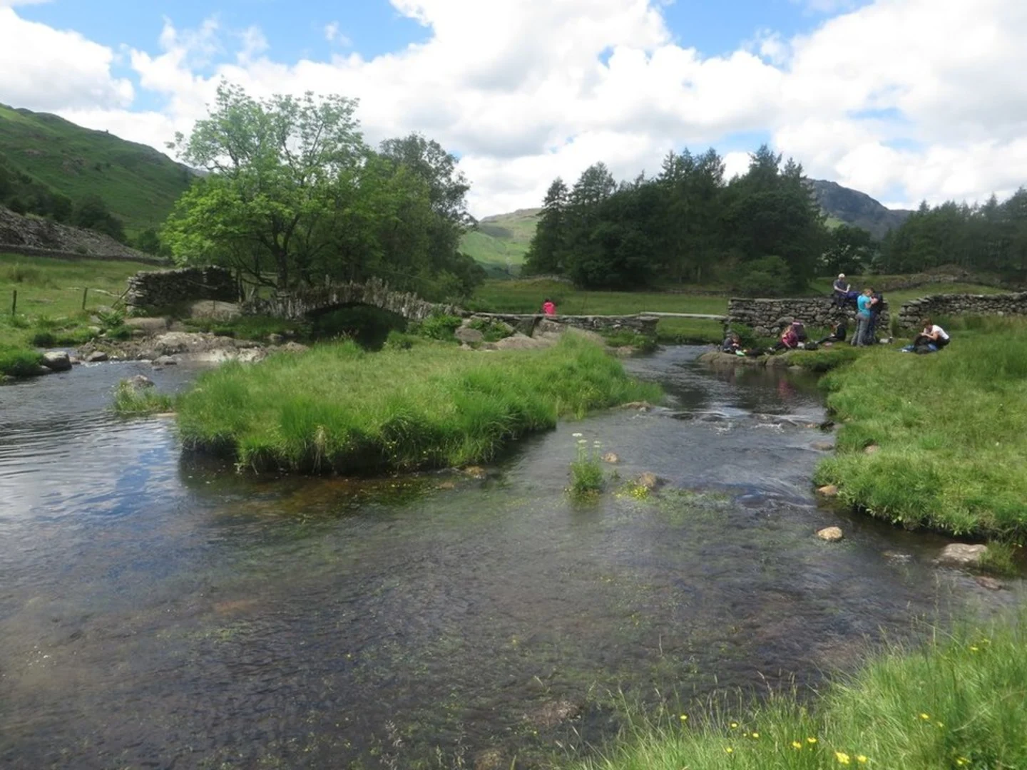 An image depicting the trail High Tilberthwaite to Moss Rigg Wood and Slater Bridge Walk and its surrounding area.