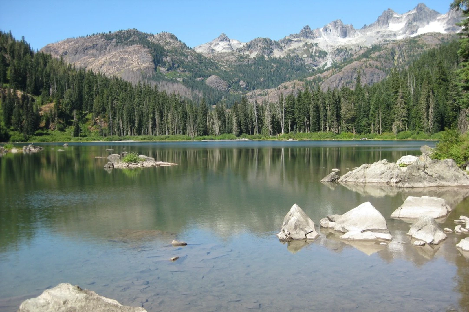 An image depicting the trail Spinola Meadow Trail via Waptus River Trail and its surrounding area.