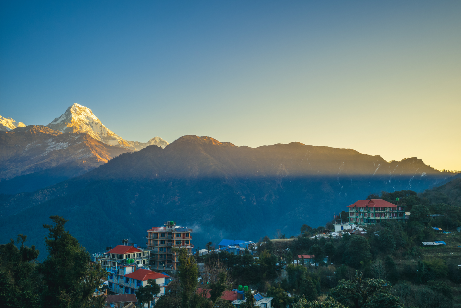 An image depicting the trail Poonhill Trek and its surrounding area.