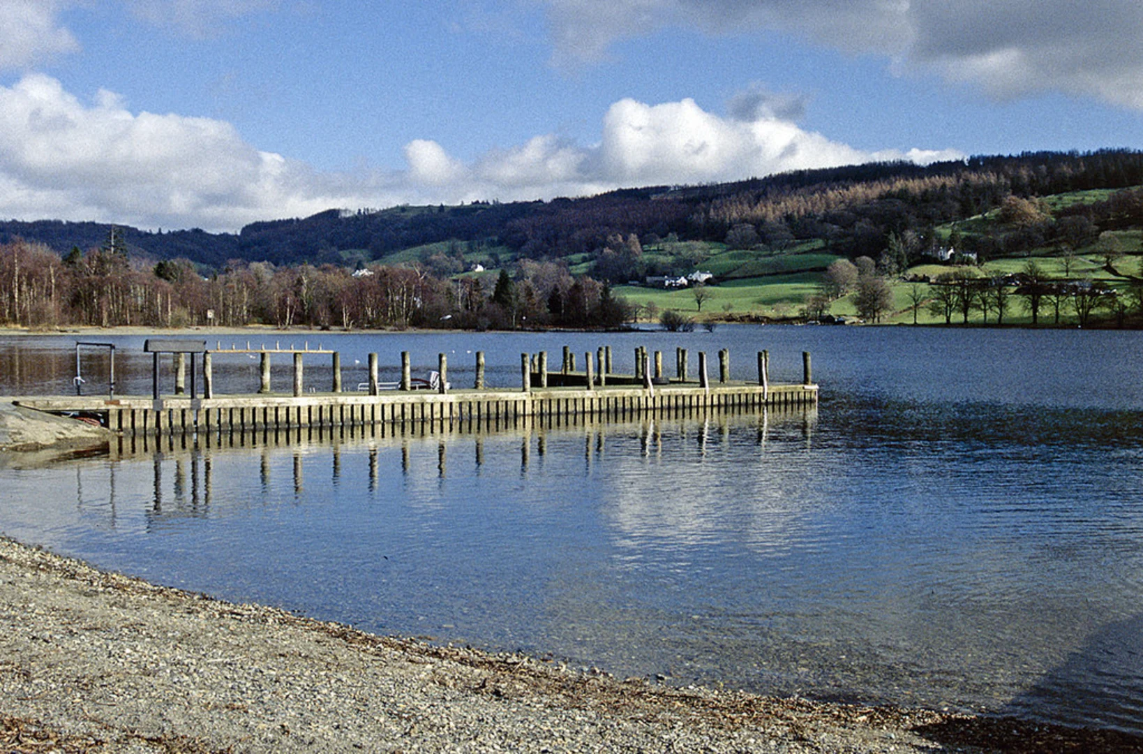 An image depicting the trail Coniston Water Shore Walk and its surrounding area.