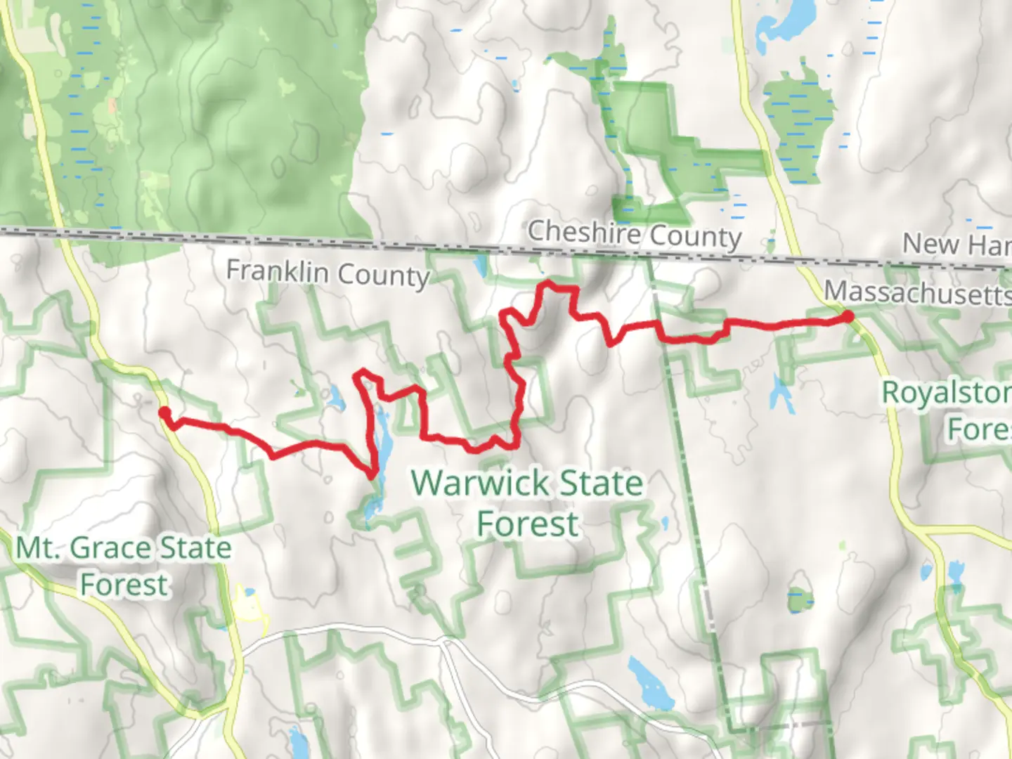 An image depicting the trail Winchester Road to Athol-Richmond Road via NET New England National Scenic Trail and its surrounding area.