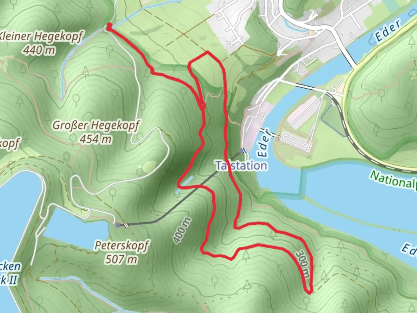 An image depicting the trail Kellerwaldsteig and Hegekopf Route and its surrounding area.